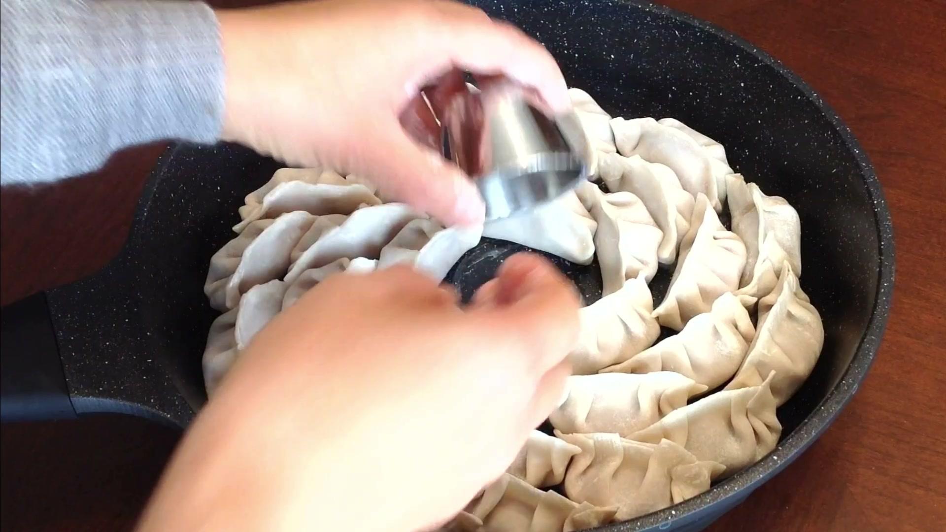 Step 4 Remove Sauce Cup Cook Dumplings on Dry Covered Fade out 11.jpg