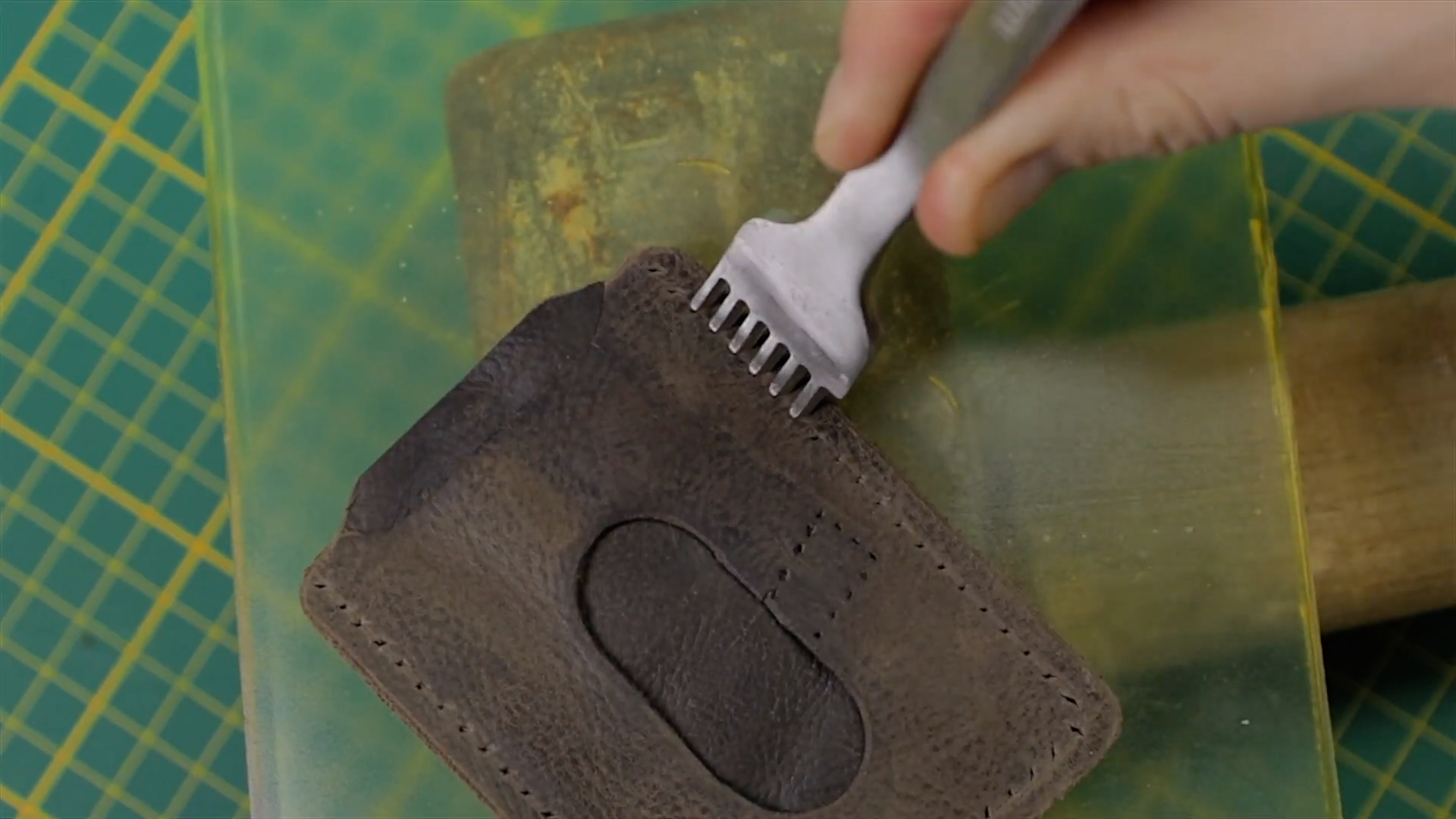 Step-7-Punching-holes-and-sewing-3.png