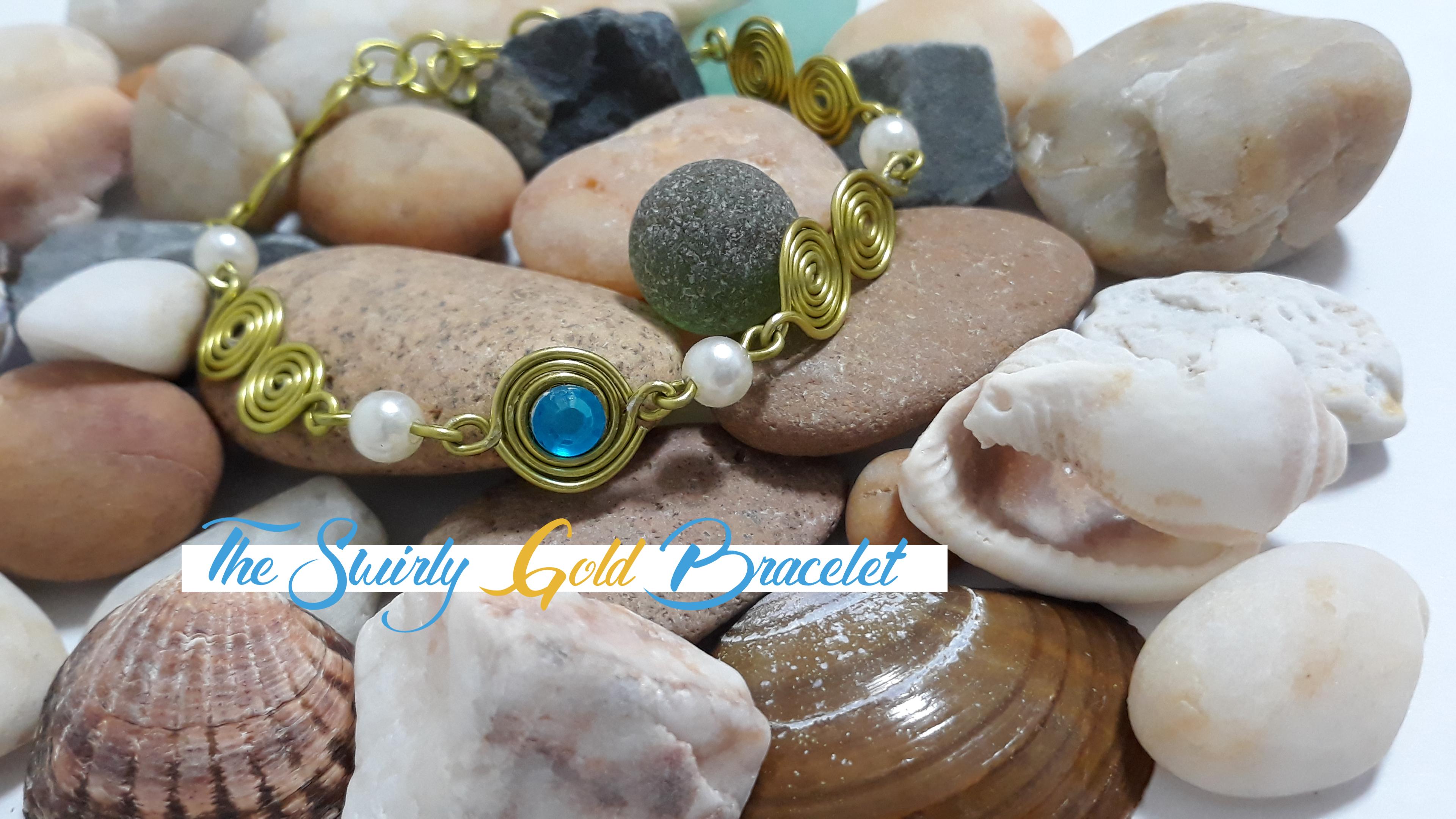 The Swirly Gold Bracelet 2.jpg