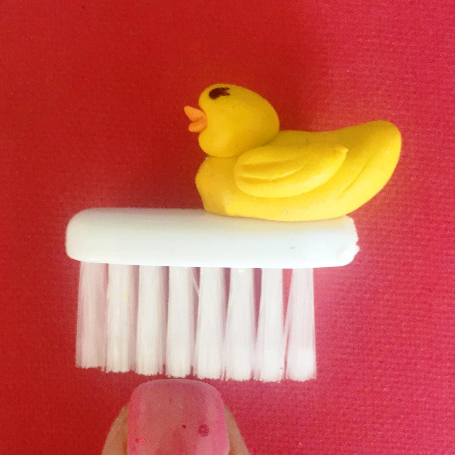 Tiny Ducky Nail Brush scale.jpg