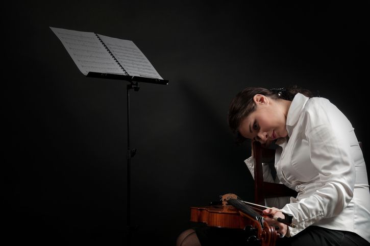 Tired but practicing violin.jpg