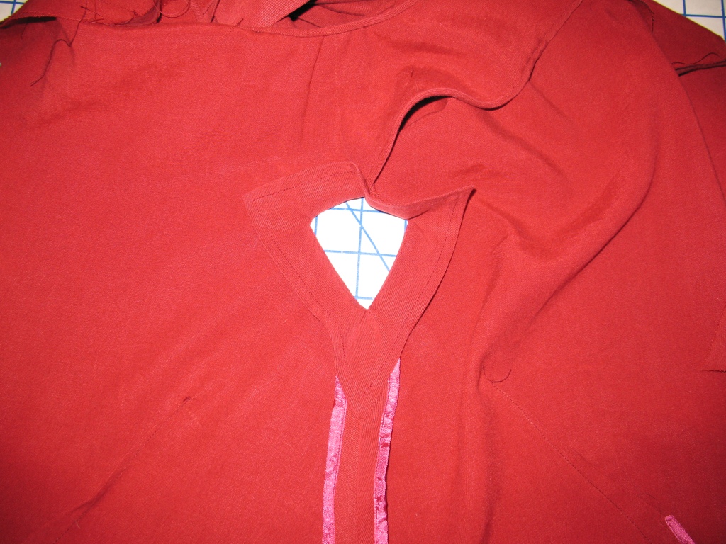 V2494.step 12.sew cutout facing.JPG