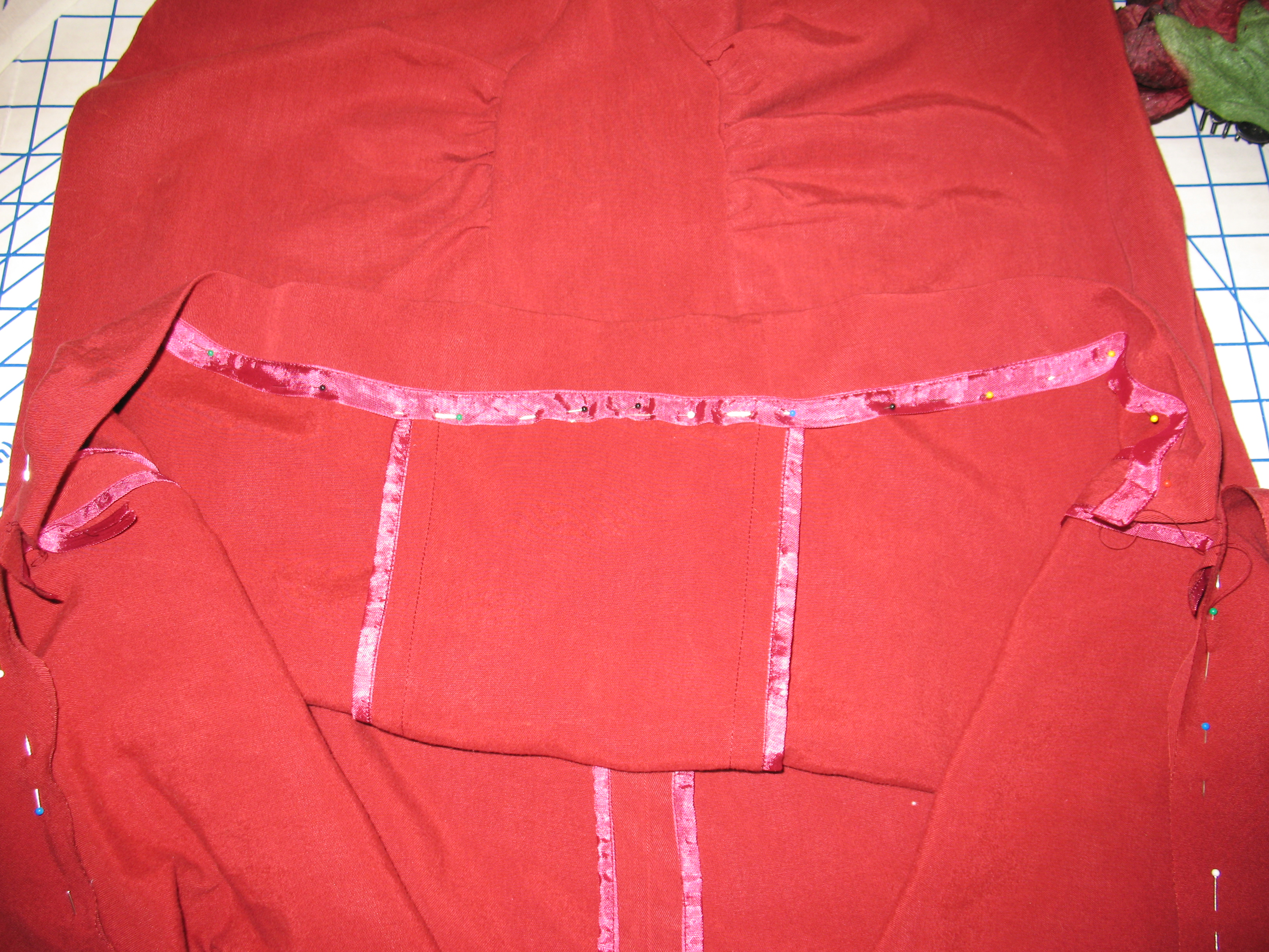 V2494.step 17.apply seam binding and turn up front hem.JPG