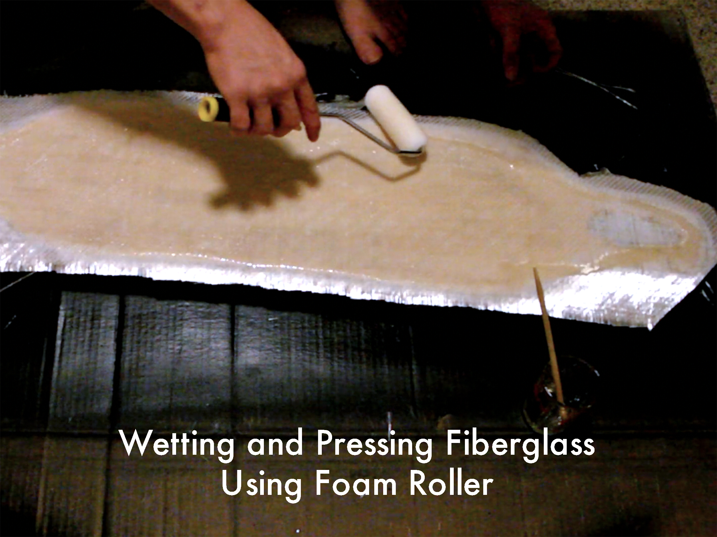 Wetting Fiberglass on Top.jpg