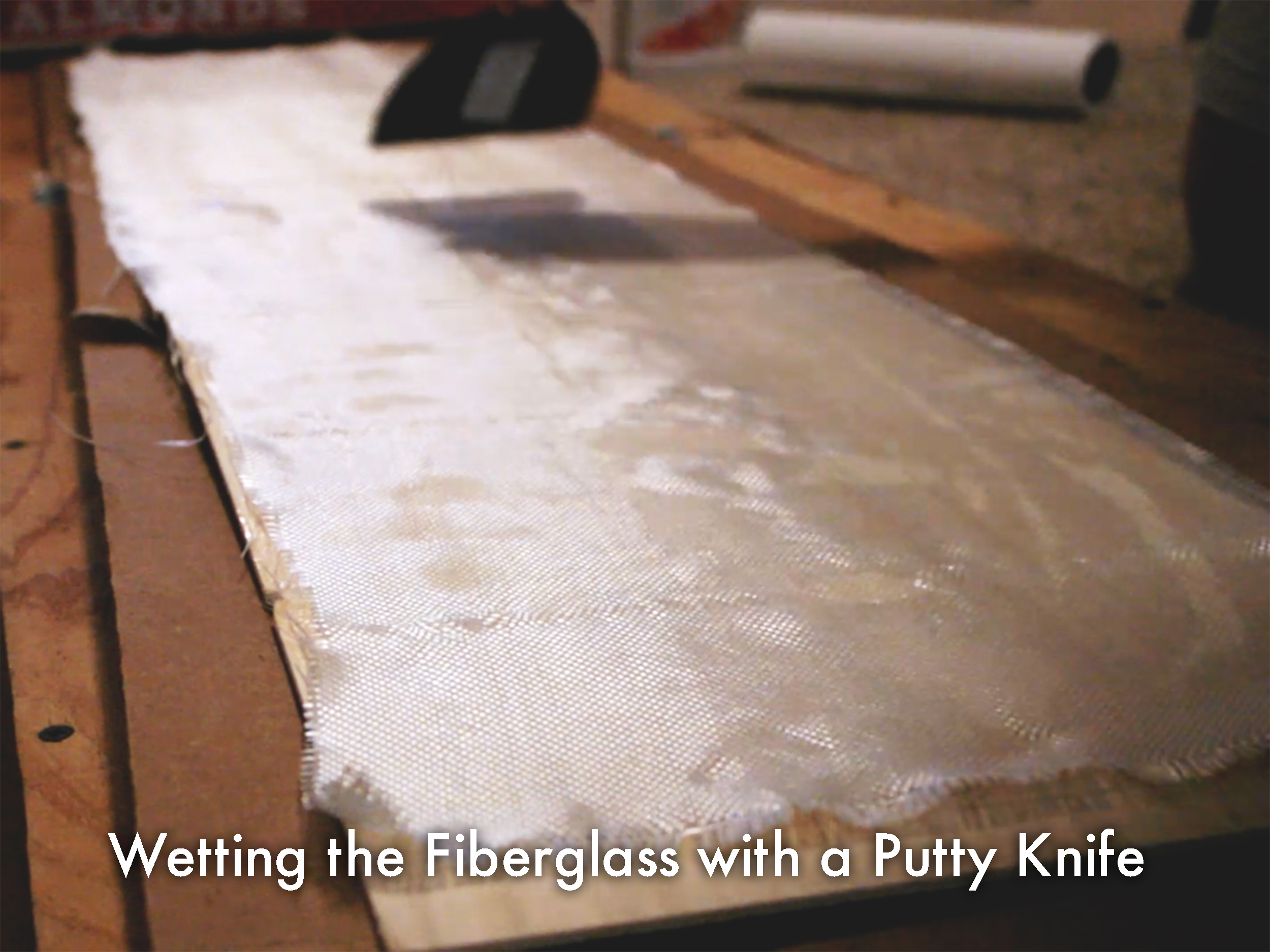 Wetting the Fiberglass.jpg