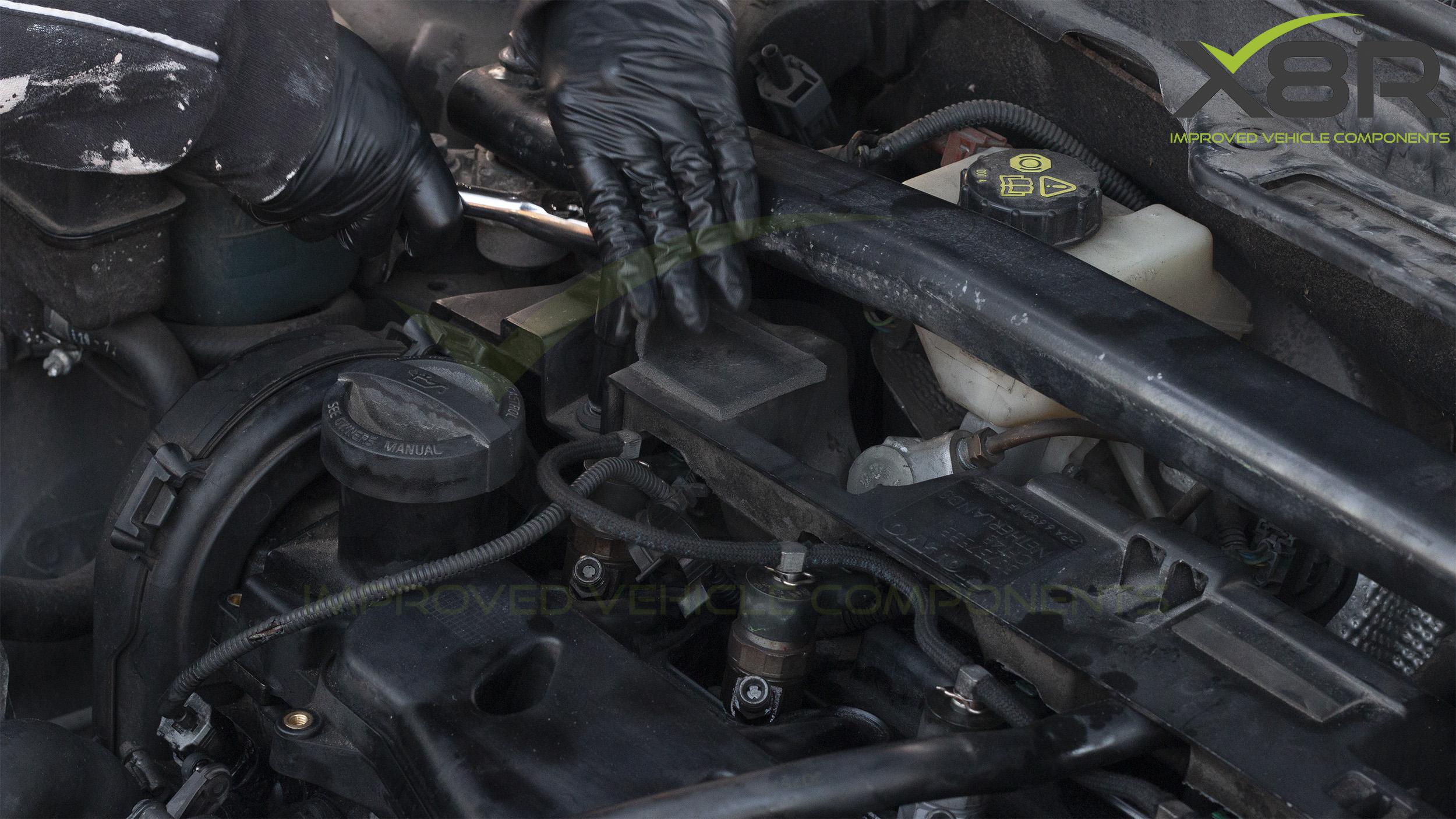 X8R0271 Remove upper engine cover.jpg