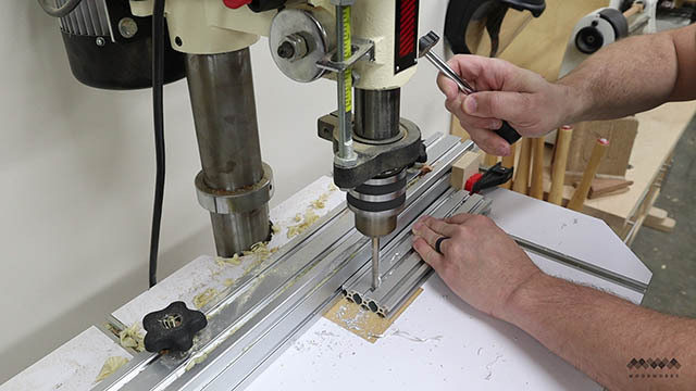 aluminum fence holes drilled.jpg