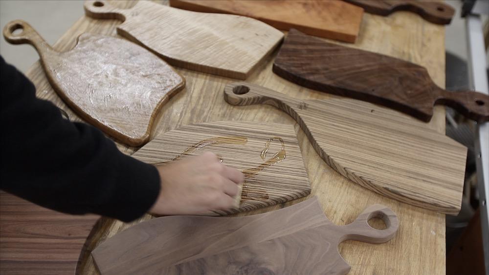 applying-finish-zebrawood-charcuterie-board.jpeg