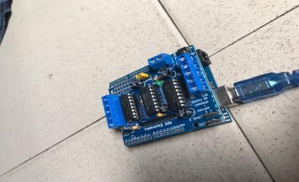 arduino mounted to motor driver.jpg