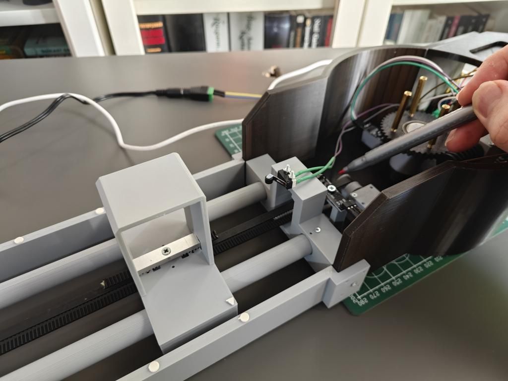assembly_70_slider_belt_position_calibration_w_band.jpg
