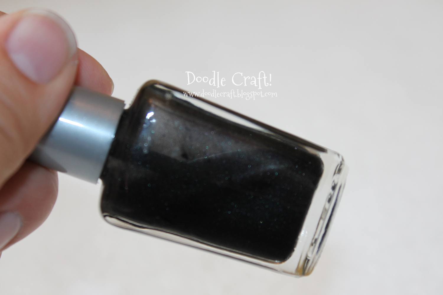 black nail polish diy with clear and eye shadow.jpg