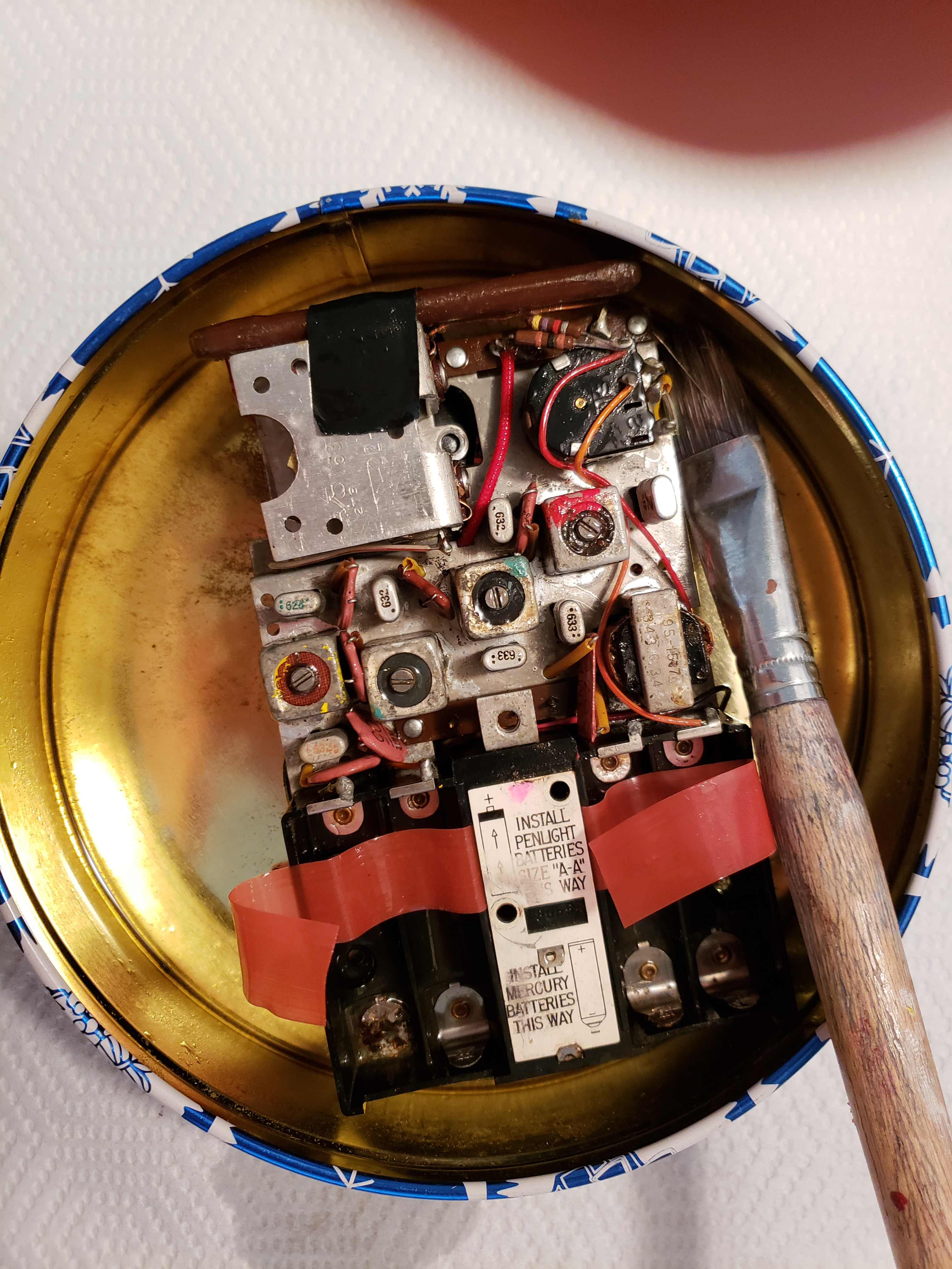 cleaning chassis top side with methyl hydrate and brush.jpg