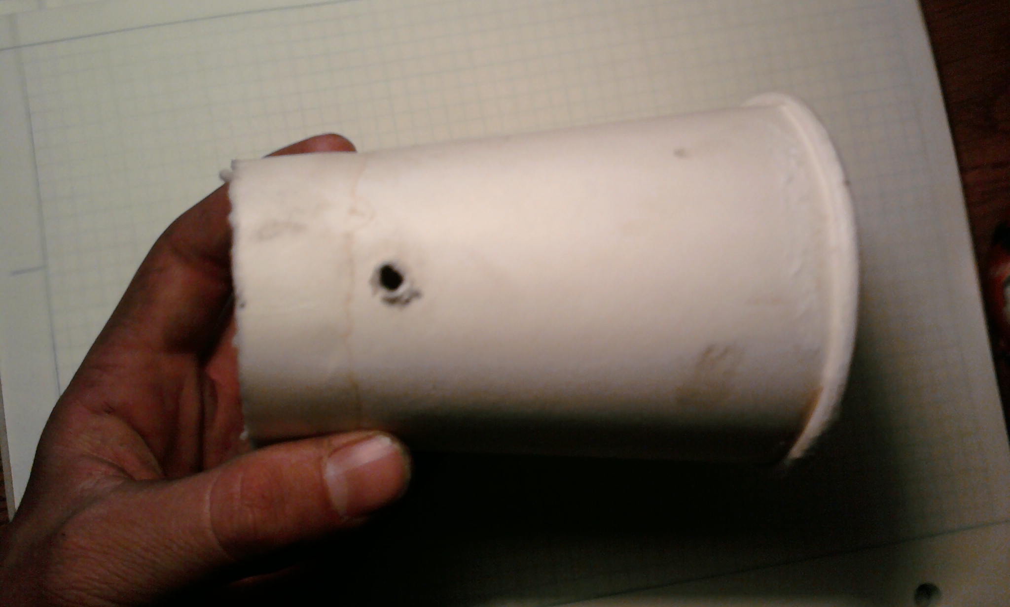 cup with hole in side ond no bottom.jpg