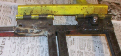 cut off saw hinges to base.jpg