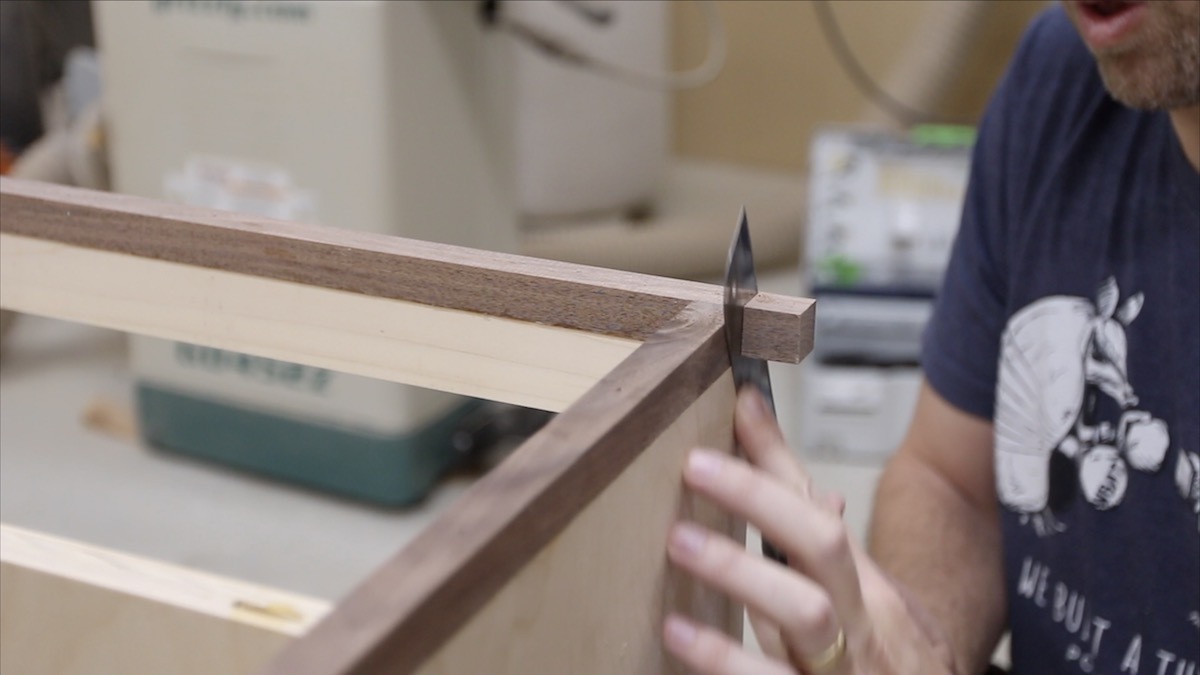 cutting-walnut-trim-flush-with-cabinet.jpeg