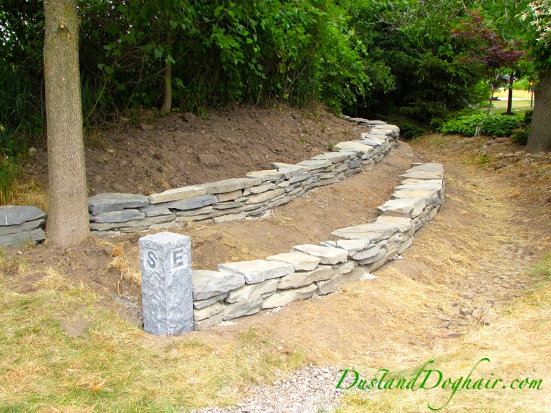 diy dry stack stone retaining wall.jpg