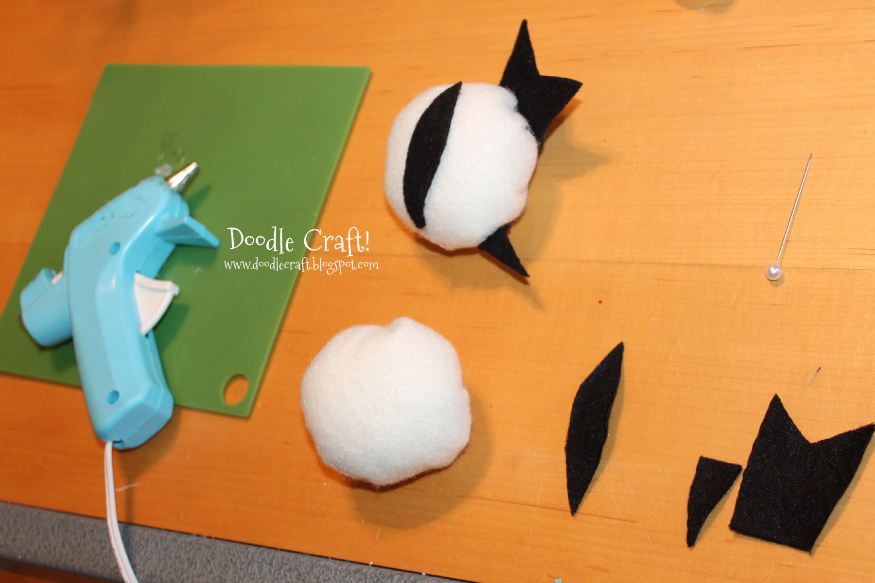 eyeball gluing hot glue.jpg
