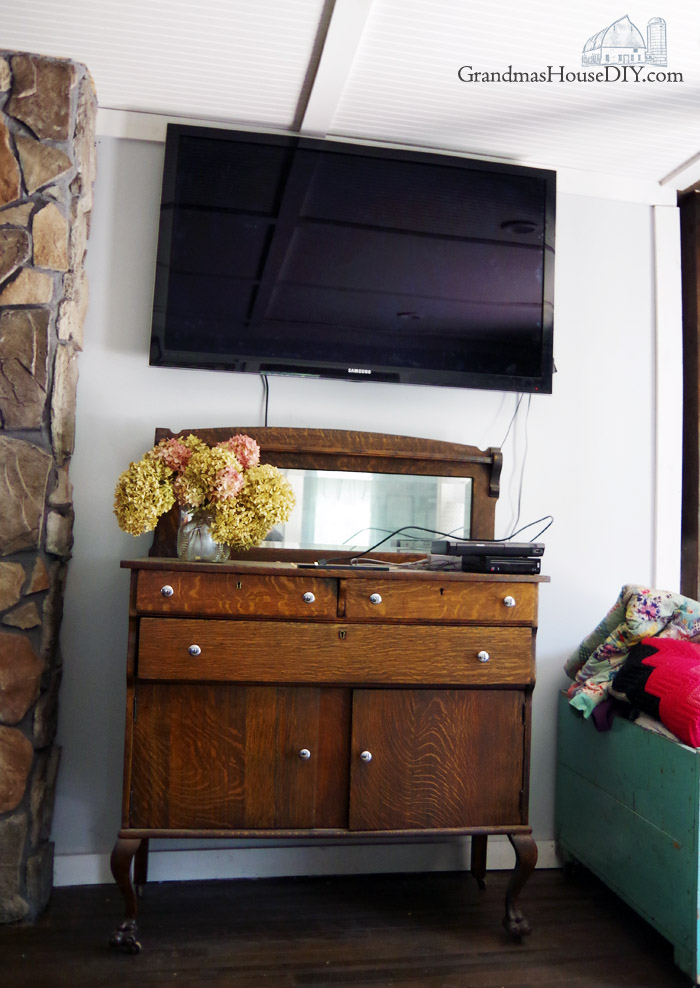 faux-wood-floating-shelf-mantel-how-to-hide-tv-cords.jpg