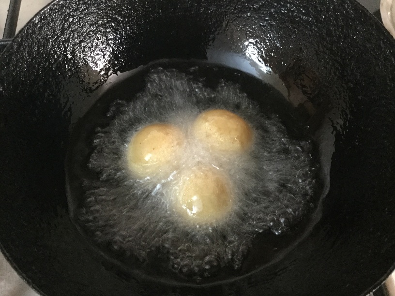 frying bread gulab jamun.jpg