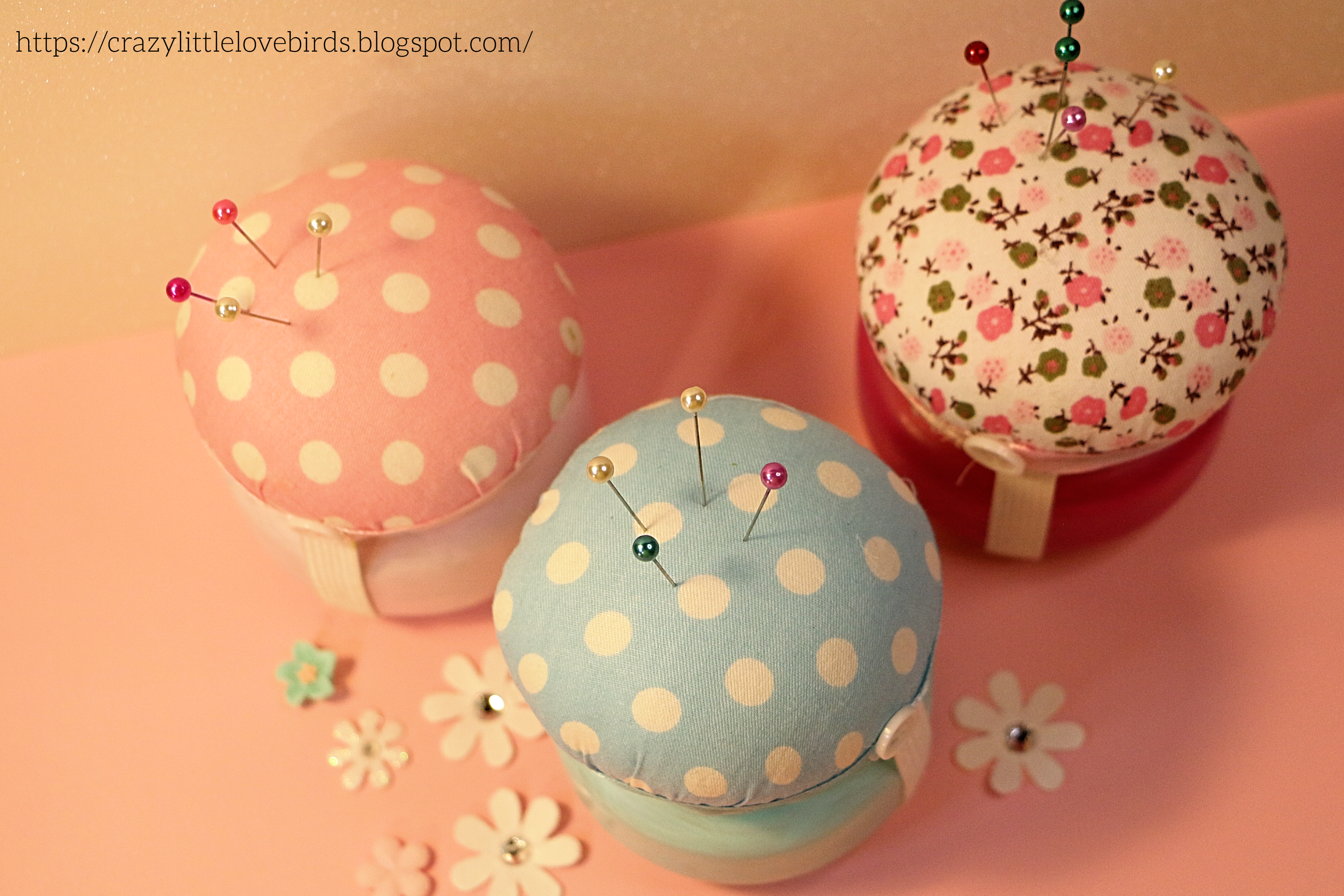 glass jars with pin cushions-.png