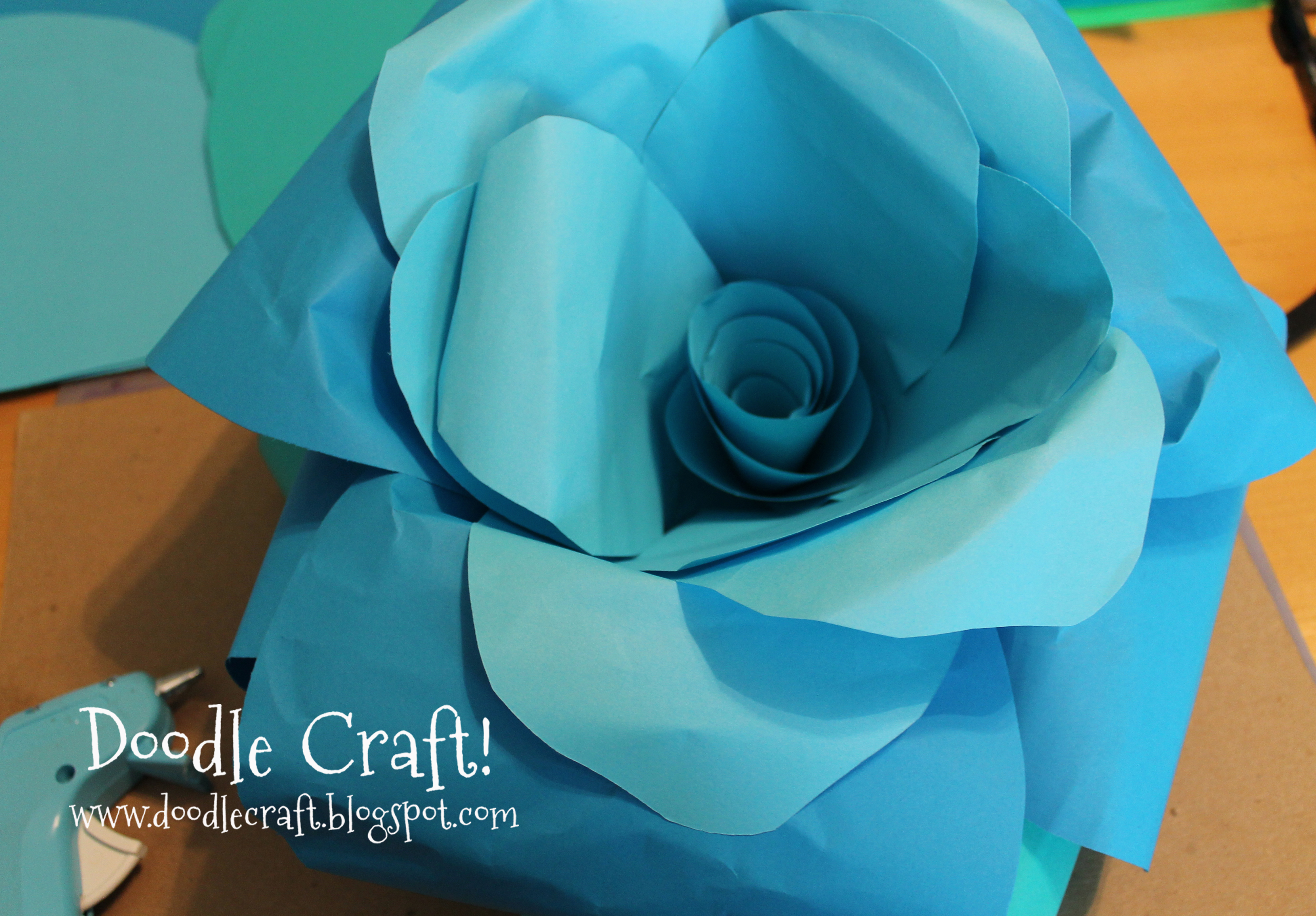 glue gun and giant paper flowers.jpg