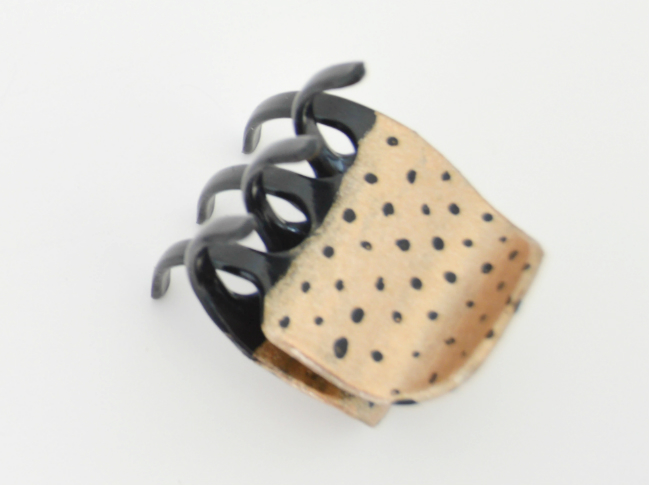 gold jaw clips with black polka dots.jpg