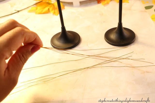 gold wire and candle holders.jpg