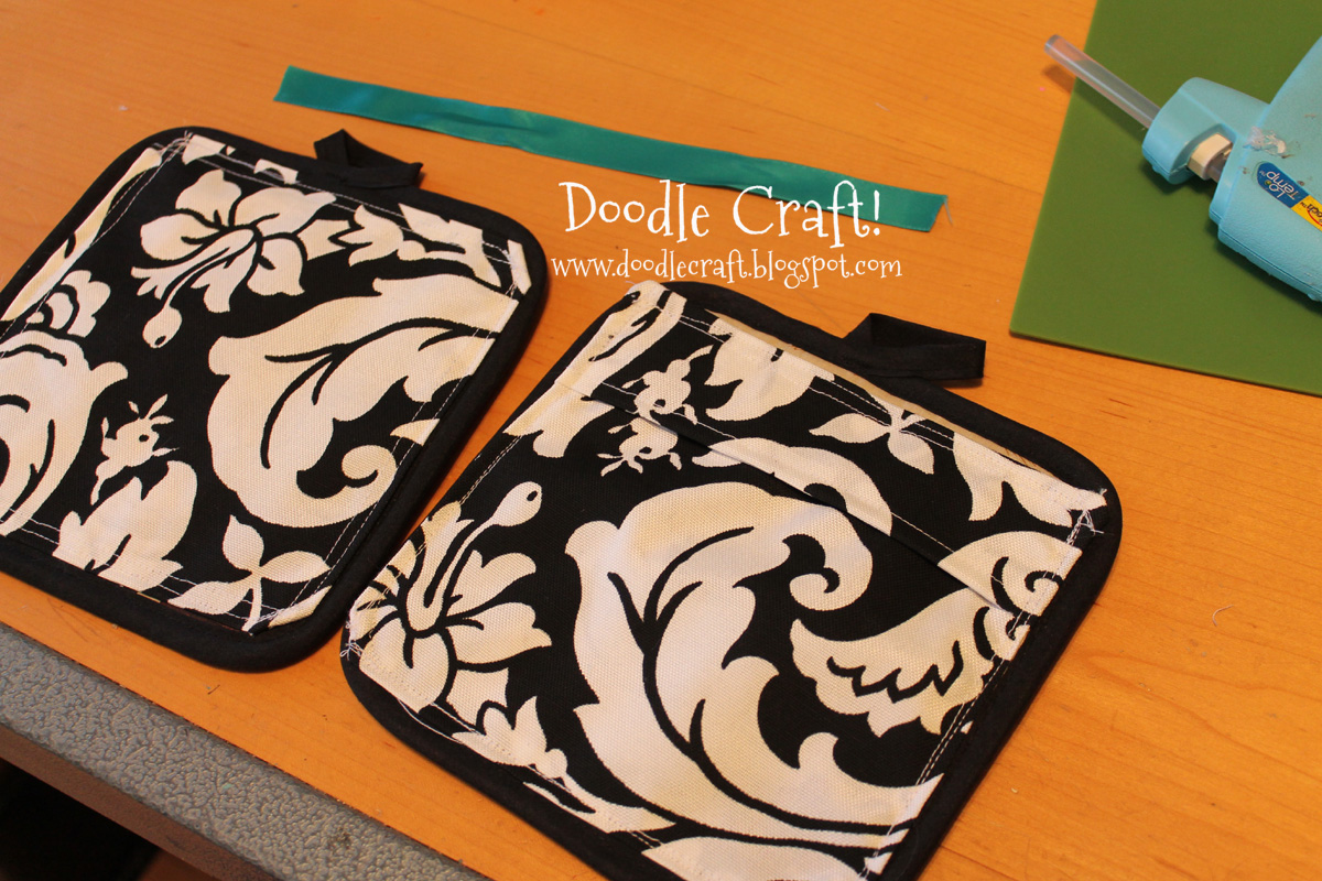 hot pads sewn and hot glue ribbon for first aid kit.jpg