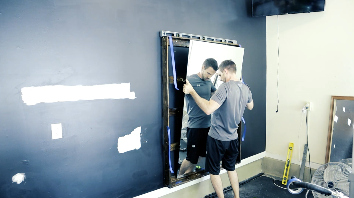 install the mirror in home gym.PNG