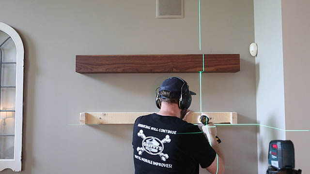 installing floating shelf IV.jpg