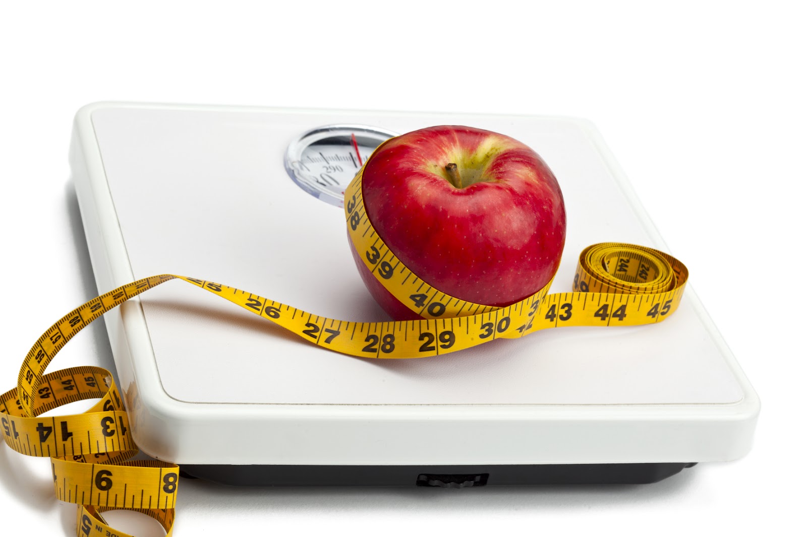 kozzi-apple-with-measuring-tape-on-weight-scale-1774x1183.jpg