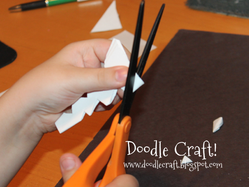 make a snowflake from paper step 18.jpg