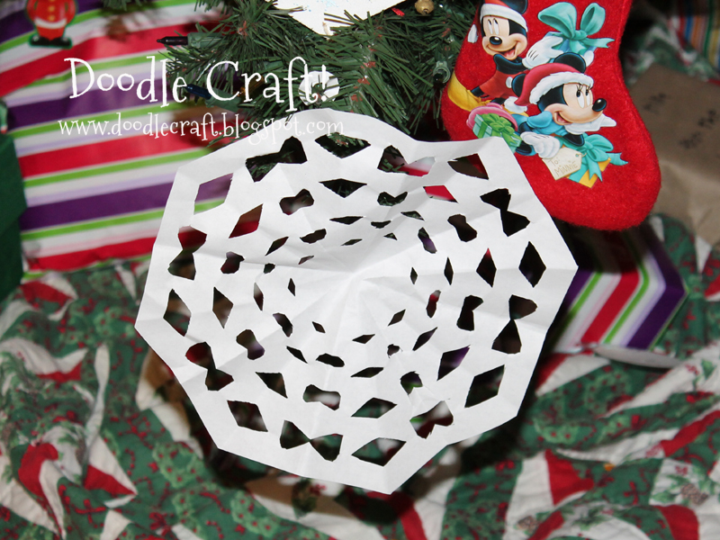 make a snowflake from paper step 27.jpg