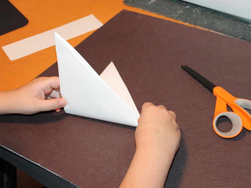 make a snowflake from paper step 8.jpg