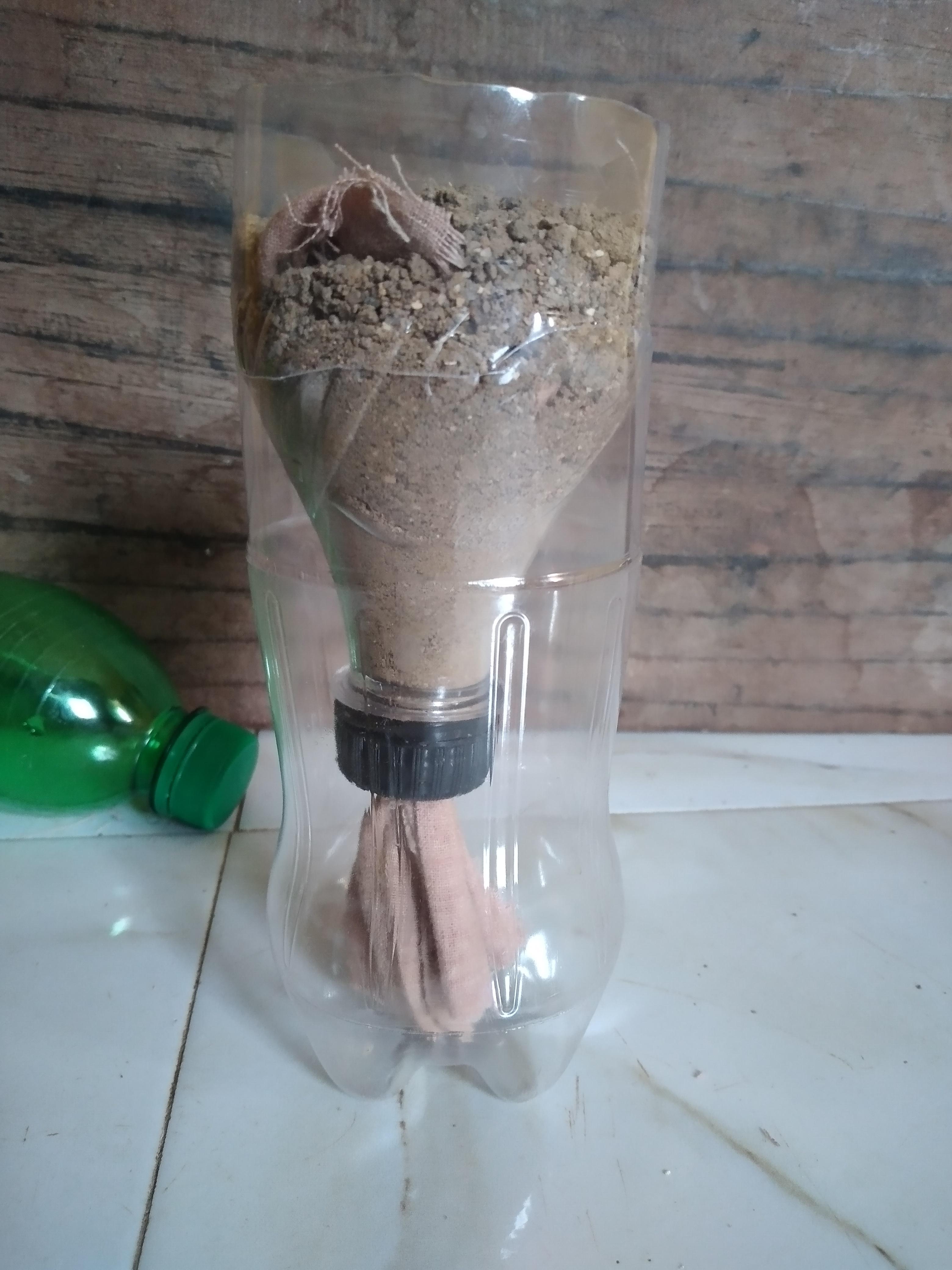 nifty plastic trash diy cheap no cost self watering (12).jpg