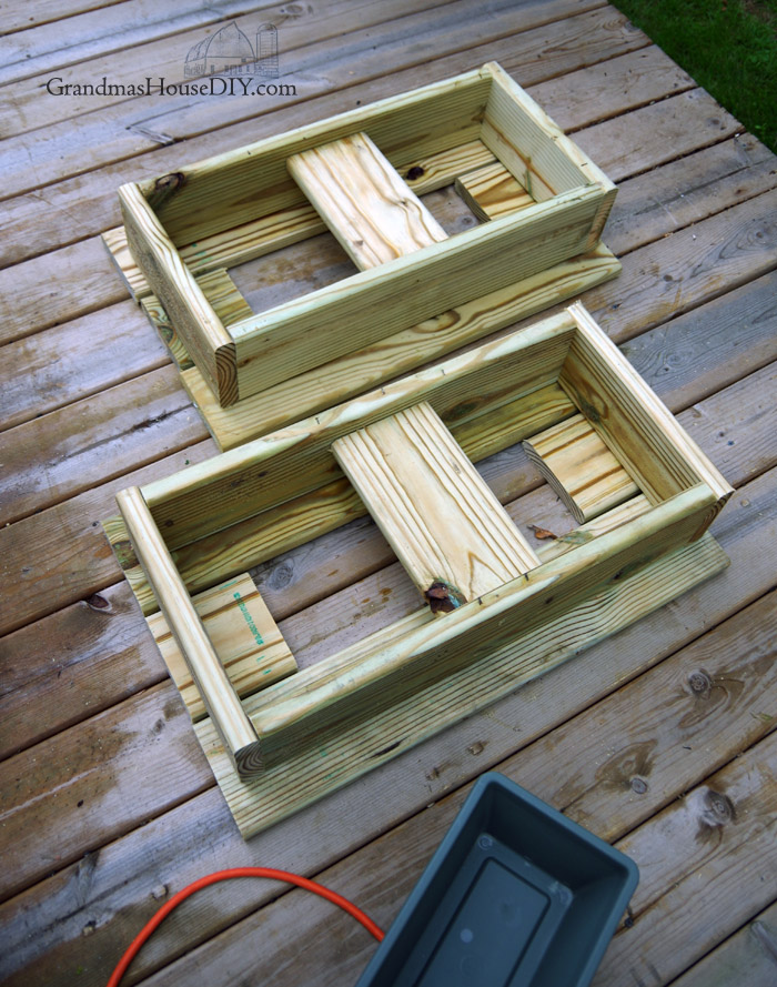 outdoor-end-table-cooler-flower-planter-deck-backyard-outdoor.jpg
