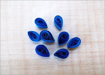 peacock-feather-using-quilling-art-stylenrich.jpg