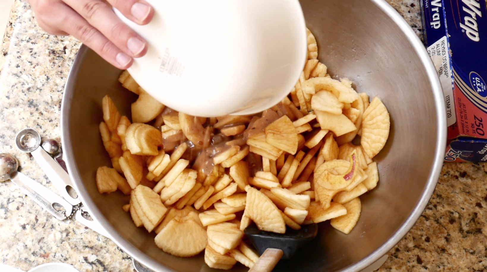 pouring the mixture into the apples.PNG