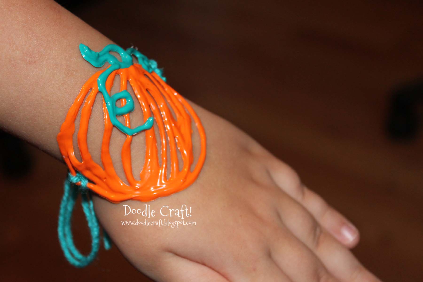 pumpkin bracelet made of puffy paints.jpg