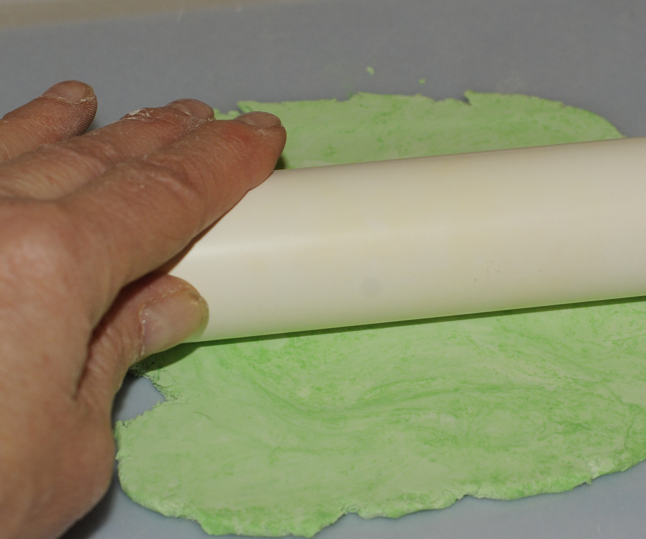 rolling out air dry clay.JPG