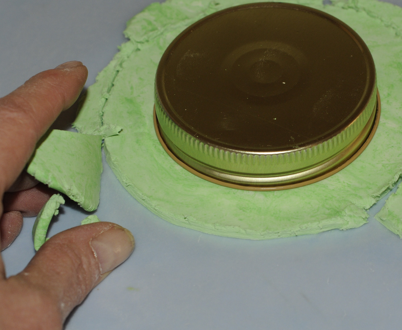 shaping the la doll clay.JPG