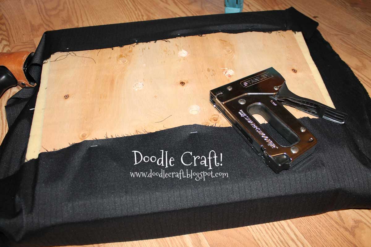 staple gun to reupholster chair.jpg