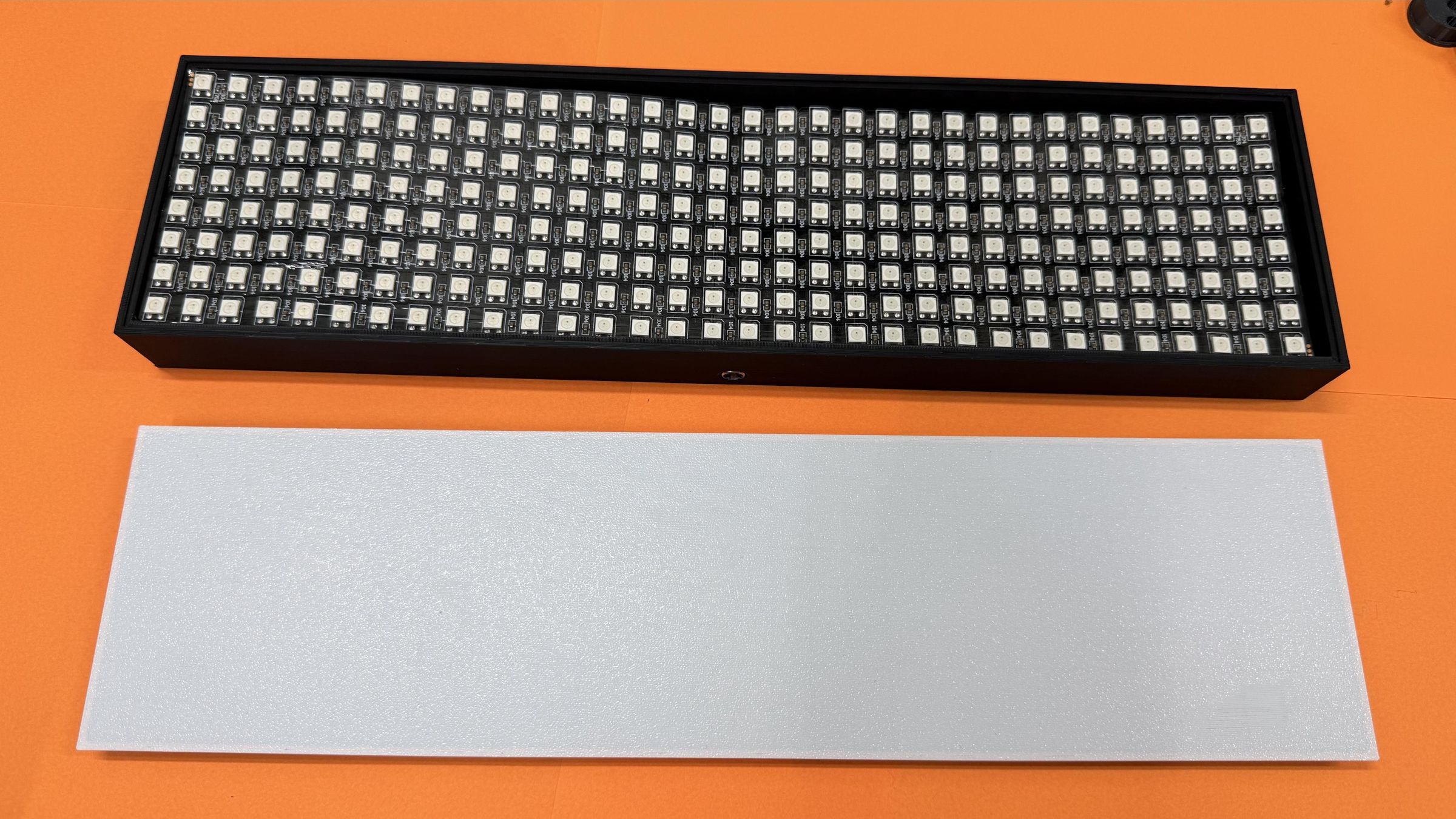 step4_24_pressing_grid_onto_led_matrix.jpg