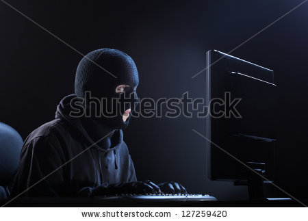 stock-photo-computer-hacker-male-thief-stealing-data-from-computer-127259420.jpg