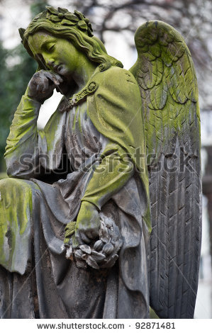 stock-photo-sculpture-of-angel-at-a-prague-cemetery-92871481.jpg