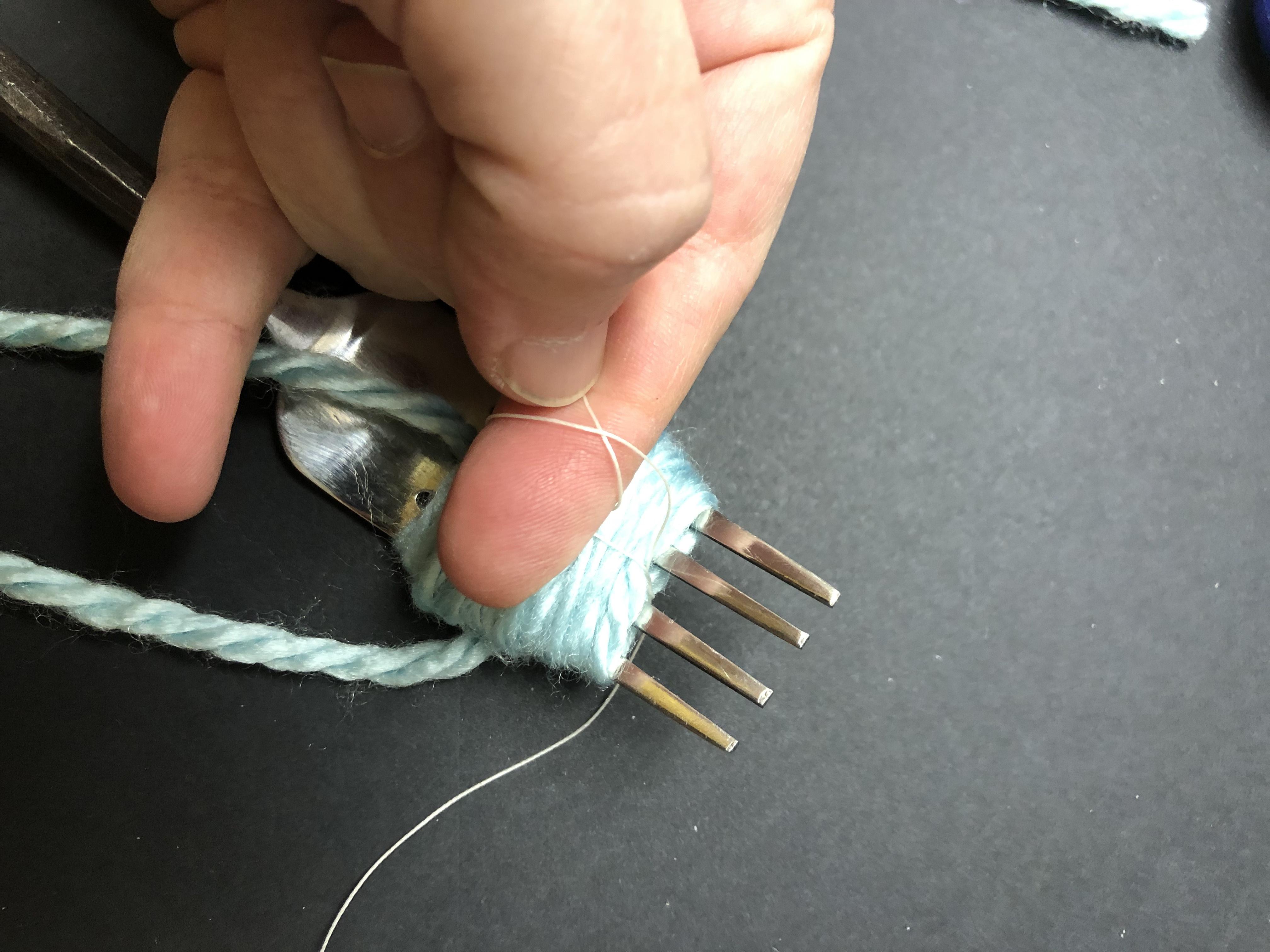 thread twist on finger 9.jpg