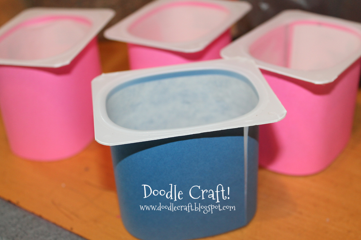 upcycled yogurt containers and nylons grass heads.jpg