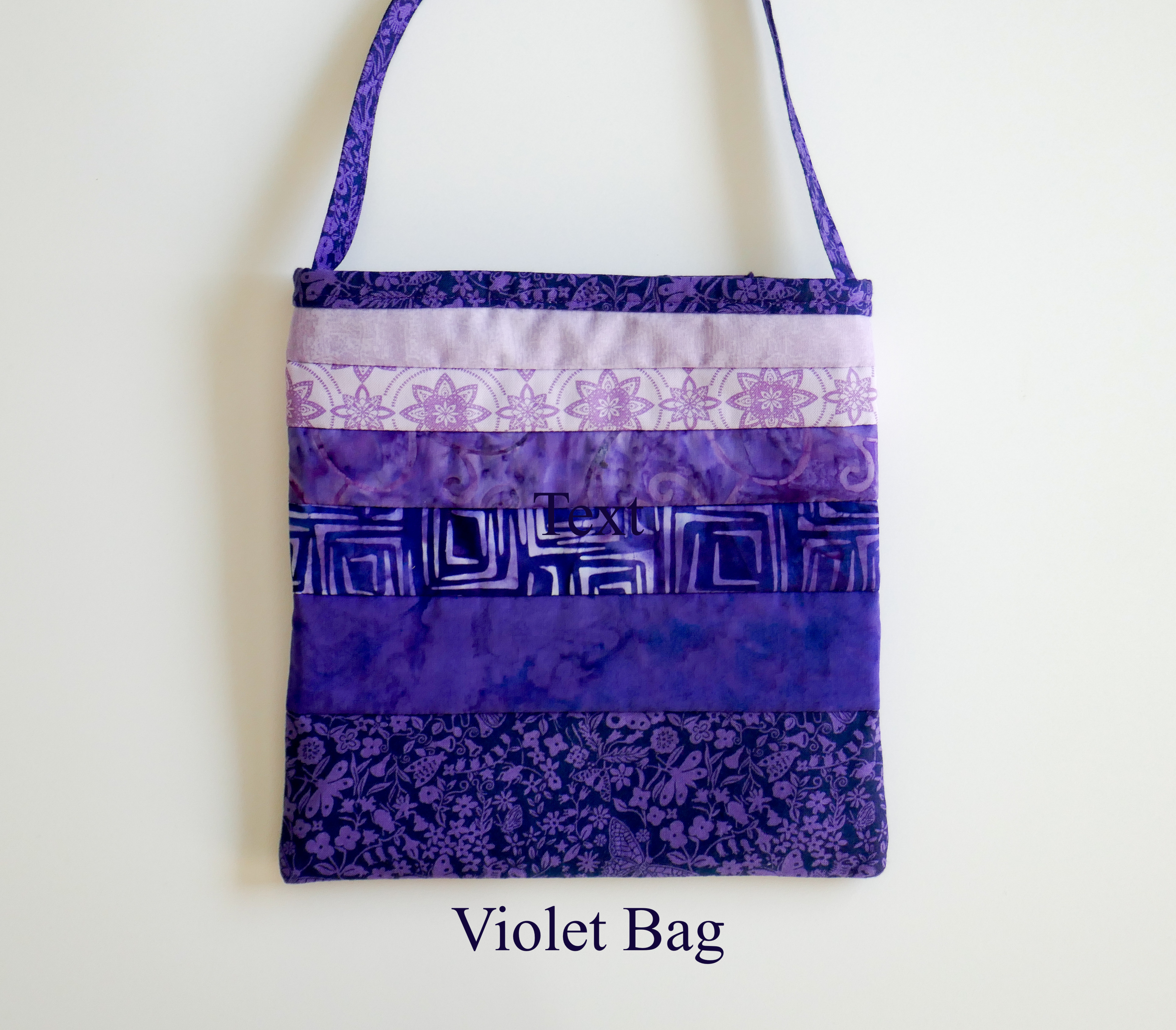 violet bag with text.jpg