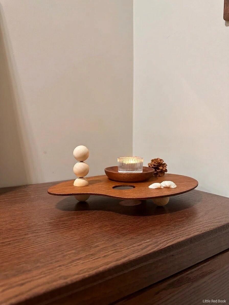 wabi-sabi-style-wooden-plinth-with-candle-and-shells-6bow.jpg