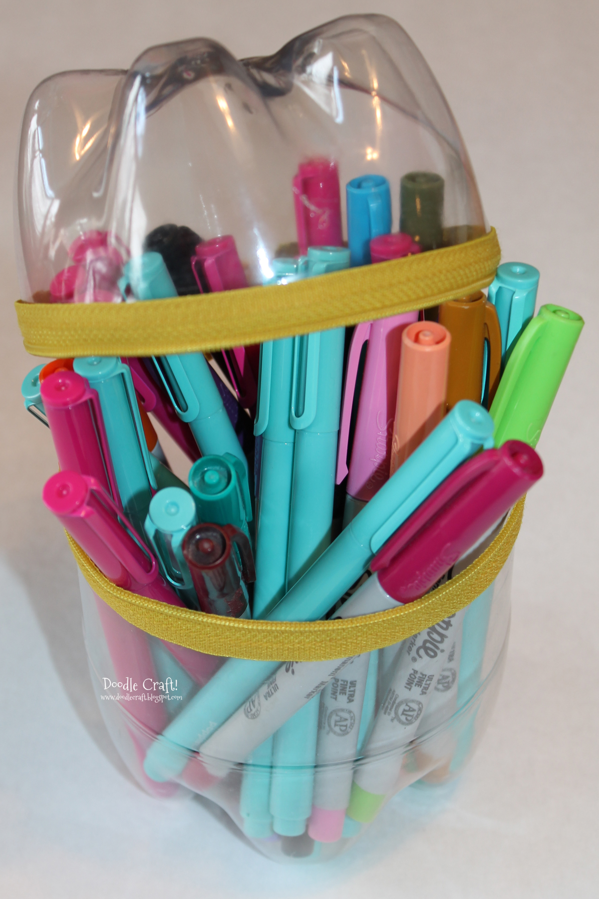 zippered pencil case diy hot glue and soda bottles.jpg
